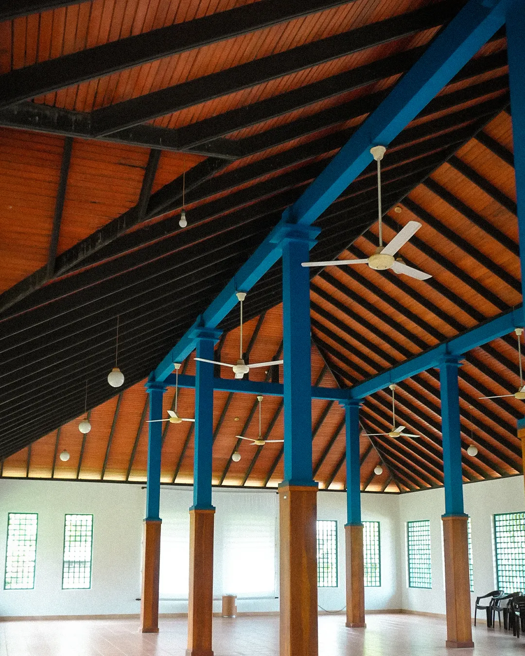 Timber-vaulted club house hall