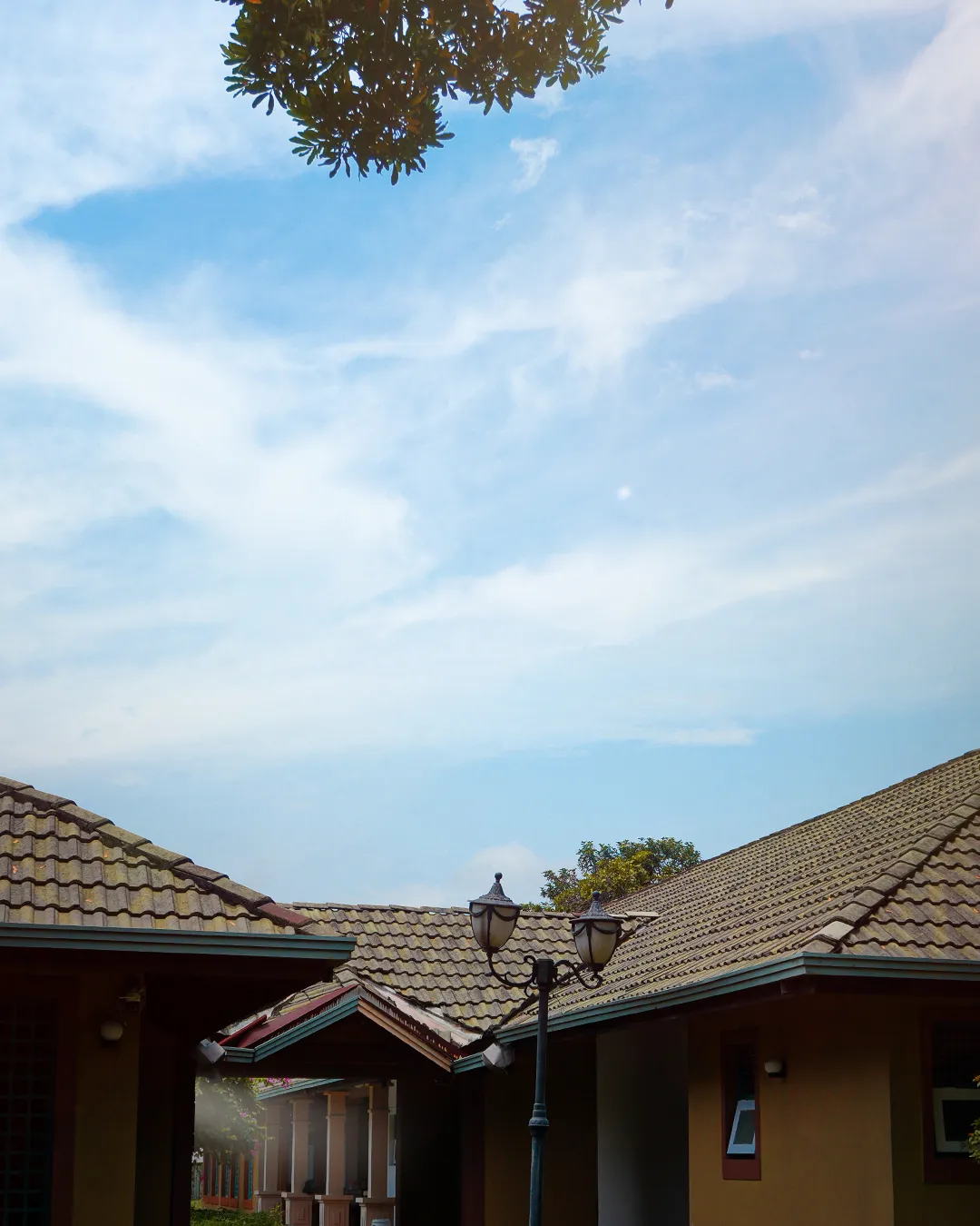 Terracotta roofline against the open sky